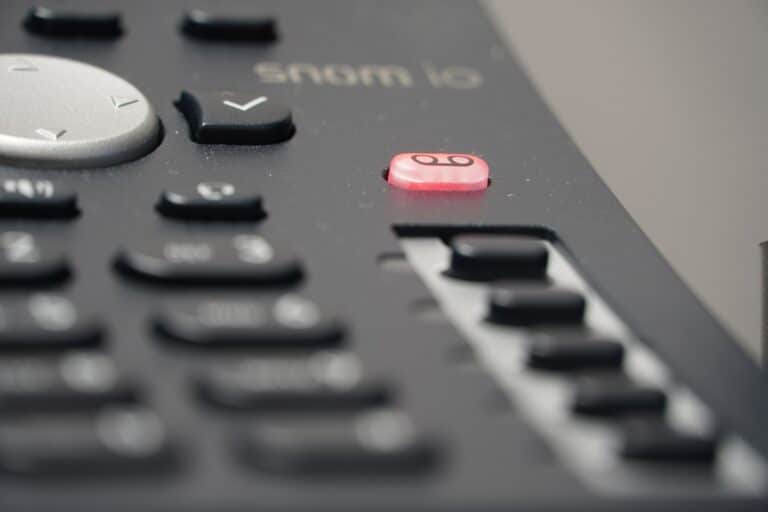 a close up of a remote control with buttons