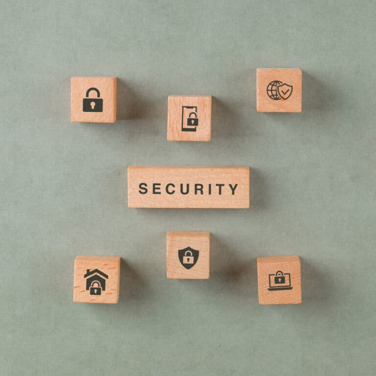 scrabbled wooden blocks with the word security on them